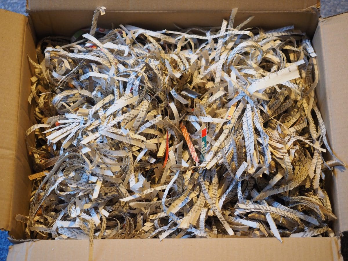 Cloggie Central Privacy Policy - Image shows shredded paper in a box.